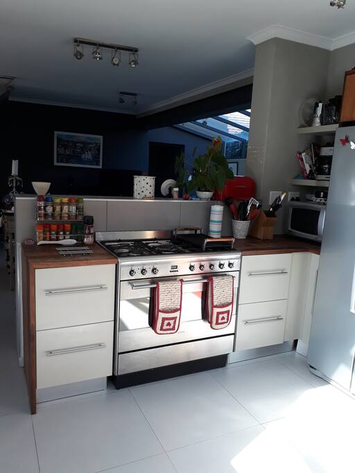Kitchen with Smeg oven looking onto the lounge