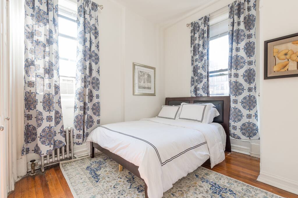 Big comfortable bed with soft freshly laundered sheets.