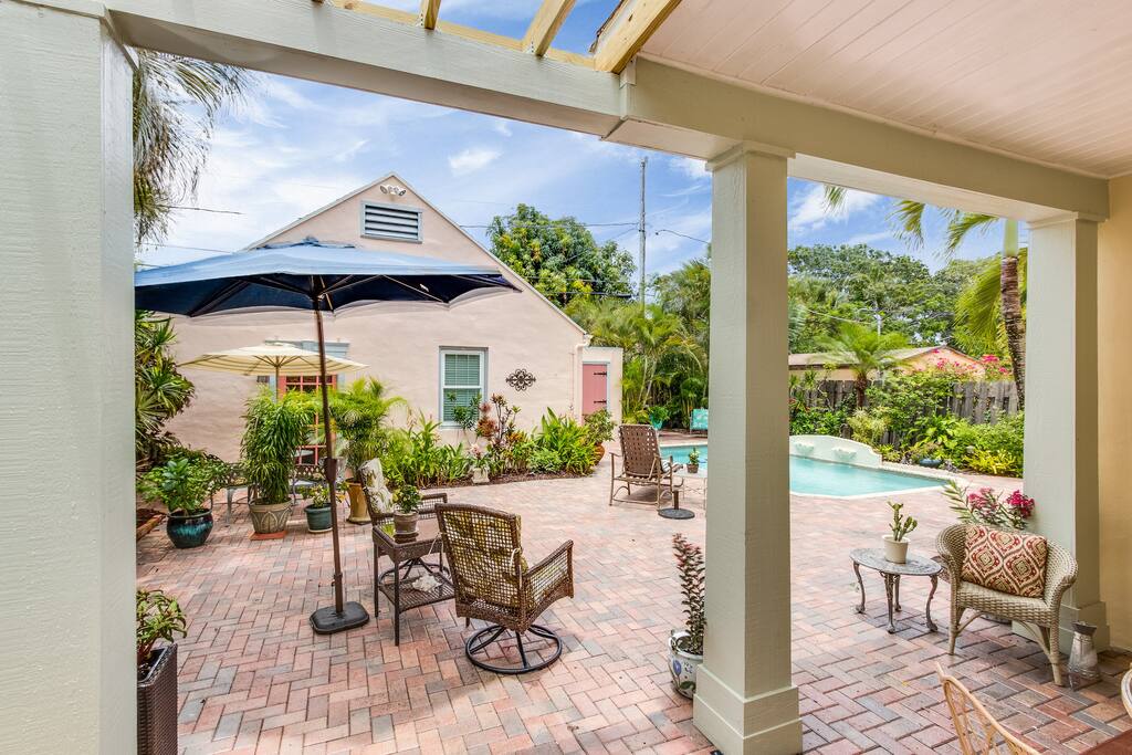 Courtyard, cottage and pool from house back door.