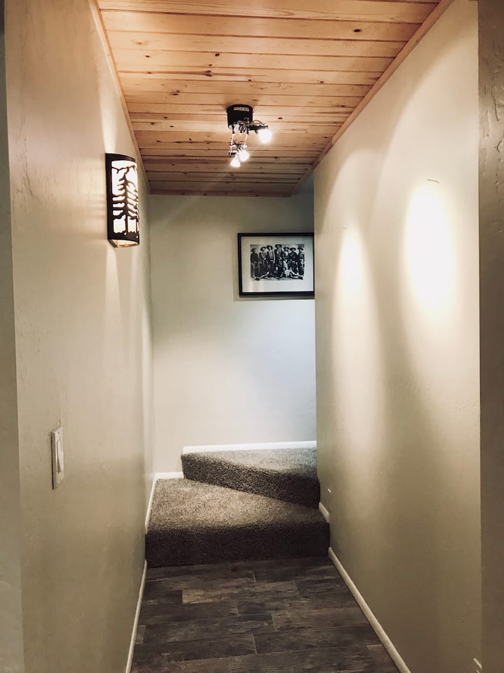 Just when you thought upstairs was cool, downstairs there’s a whole additional living space!