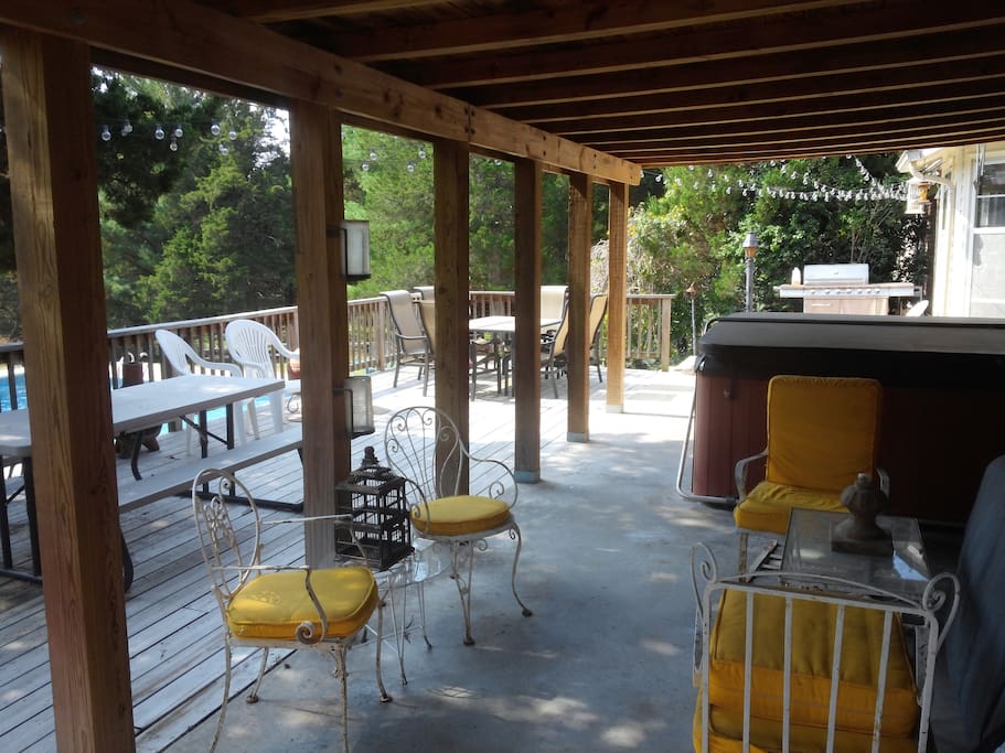 Patio deck - open, shaded and covered roof, plenty of seating. Fun lighting.