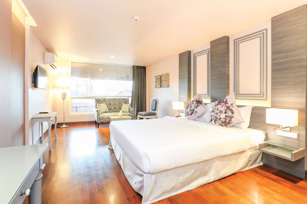 A private hotel room with natural light