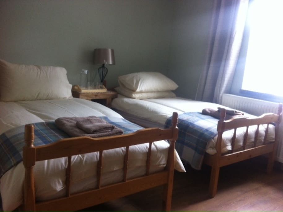 Two comfortable single beds for your stay.