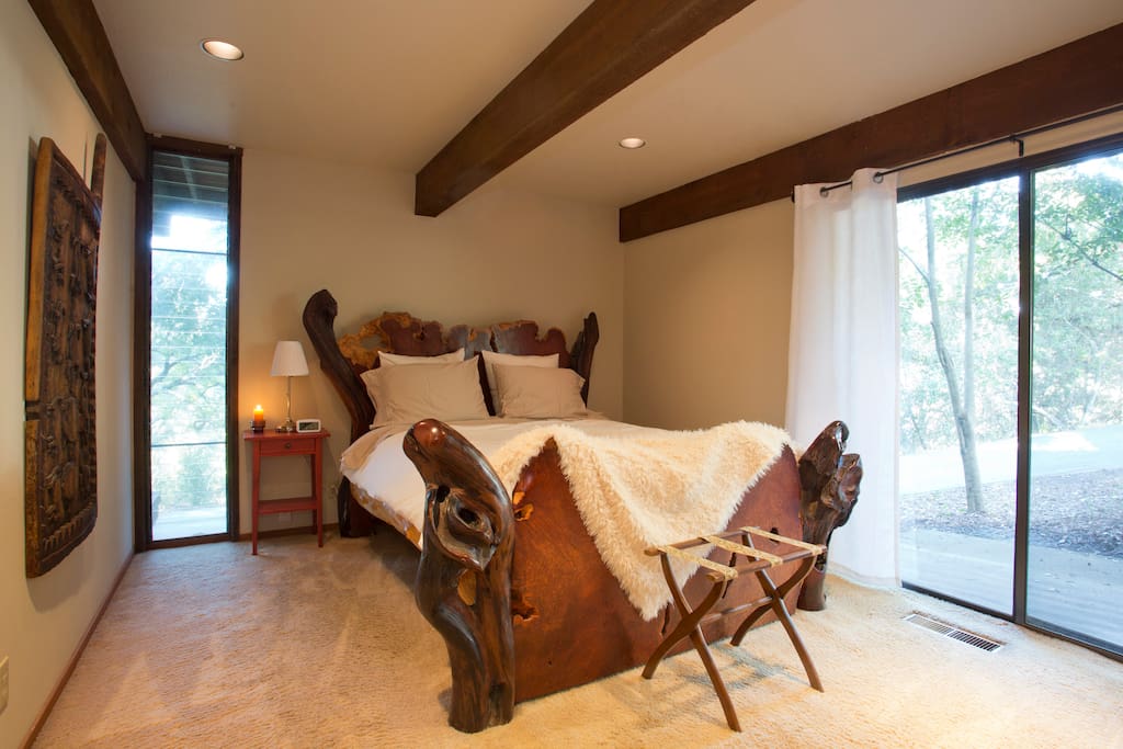 You'll see a lot of redwood throughout the house, but this bed is made of redwood burl. It adds to the flair of the unique property!