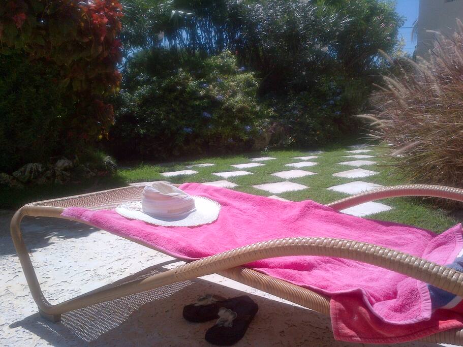 Relax in the garden by the pool