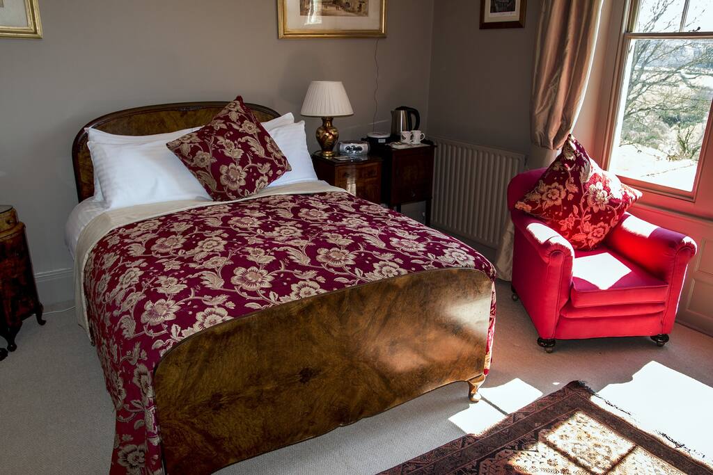 The antique double sized bed in the Walnut Room.