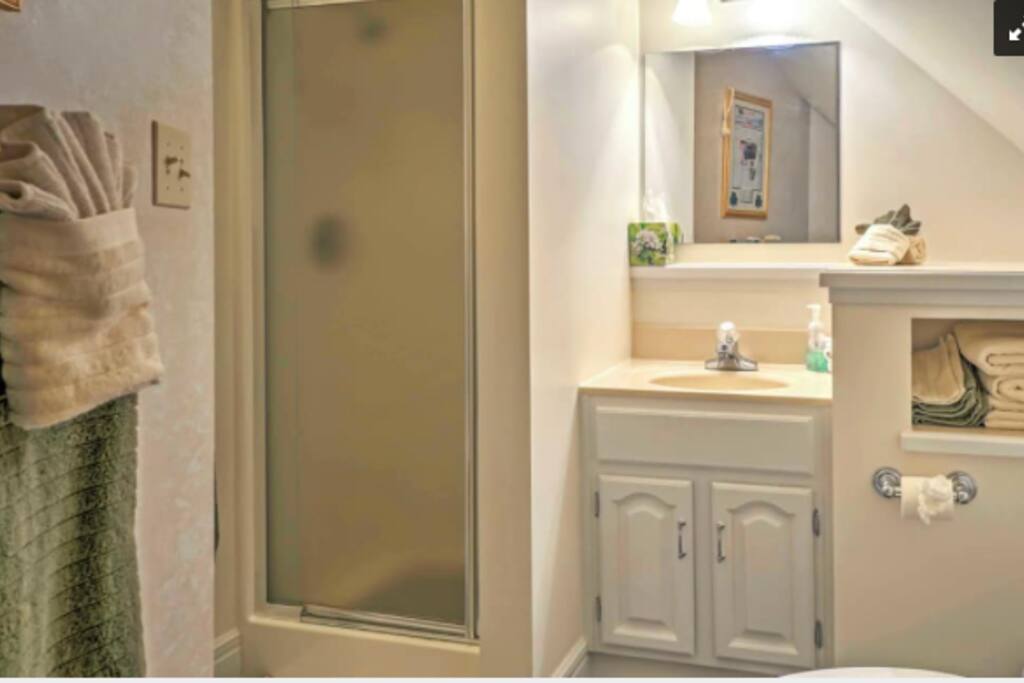 Private bathroom with shower.