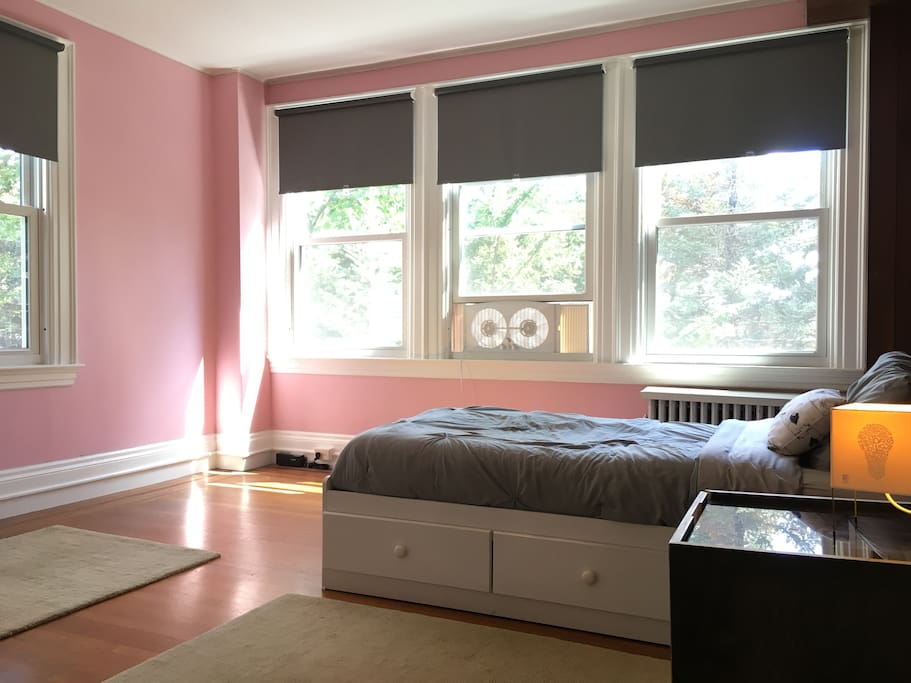 The room has wonderful natural light due to the many windows.