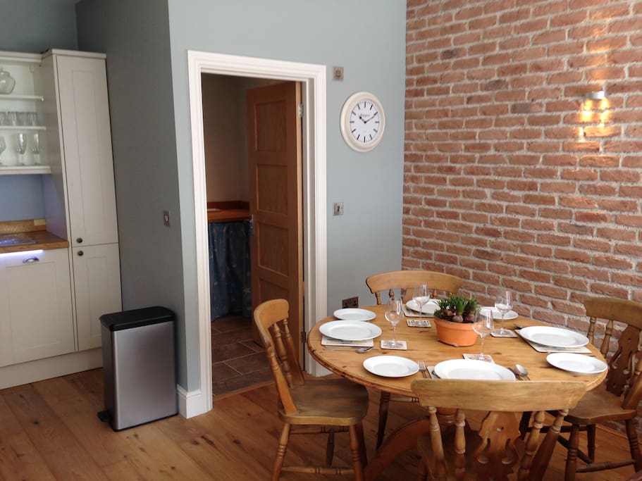 Dining area with access to washer dryer