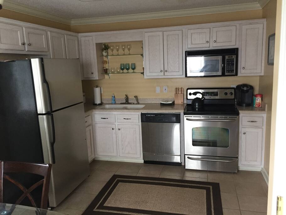 Modern kitchen with electric stove.