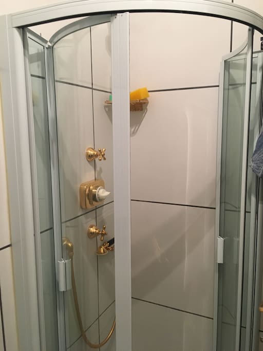 Sleek, updated bathroom with shower.