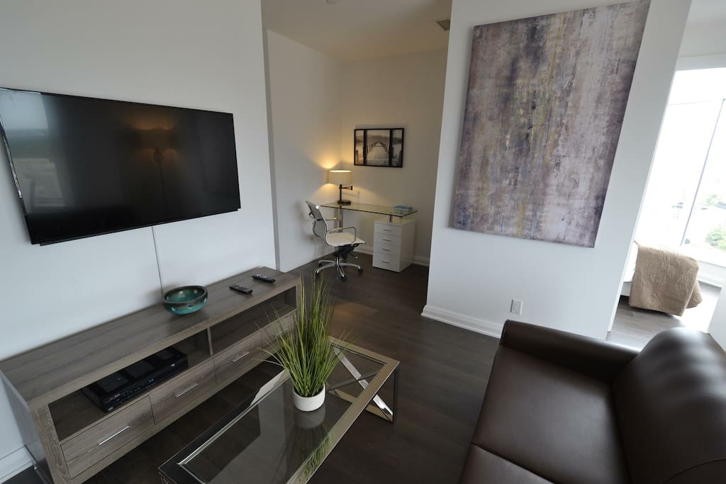 Designer decorated living / dining room with a big screen Plazma LCD TV
FREE Cable TV !
