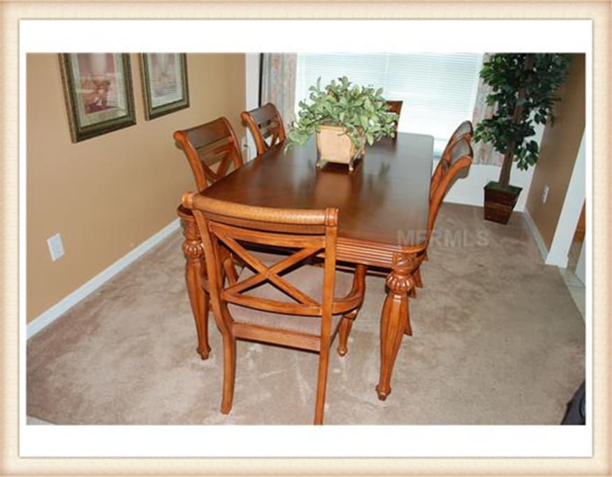 Breakfast area table and 4 chairs (and highchair)