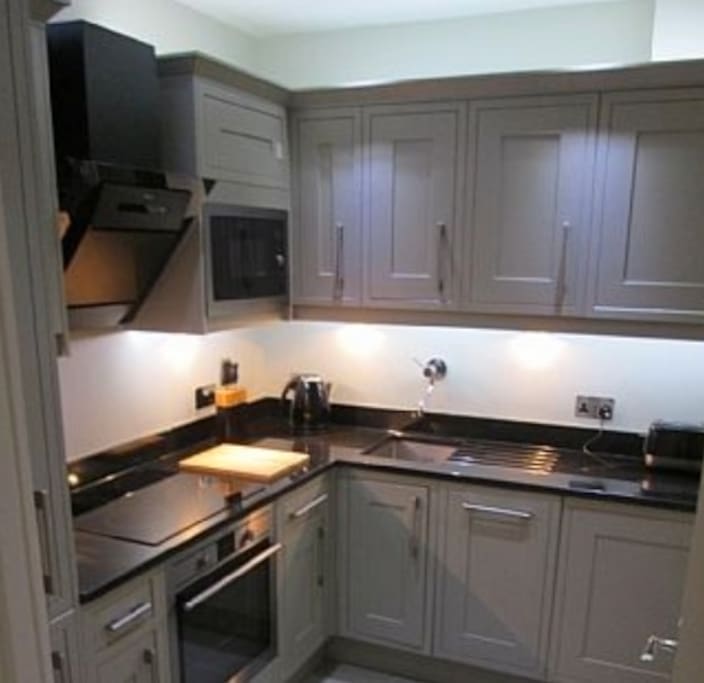 fitted kitchen with granite work top