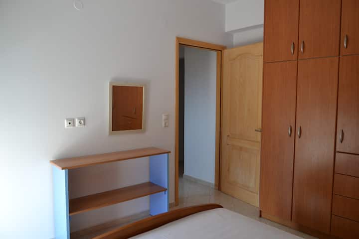 Bedroom has a double bed and roomy closet. Kefalonia apartments