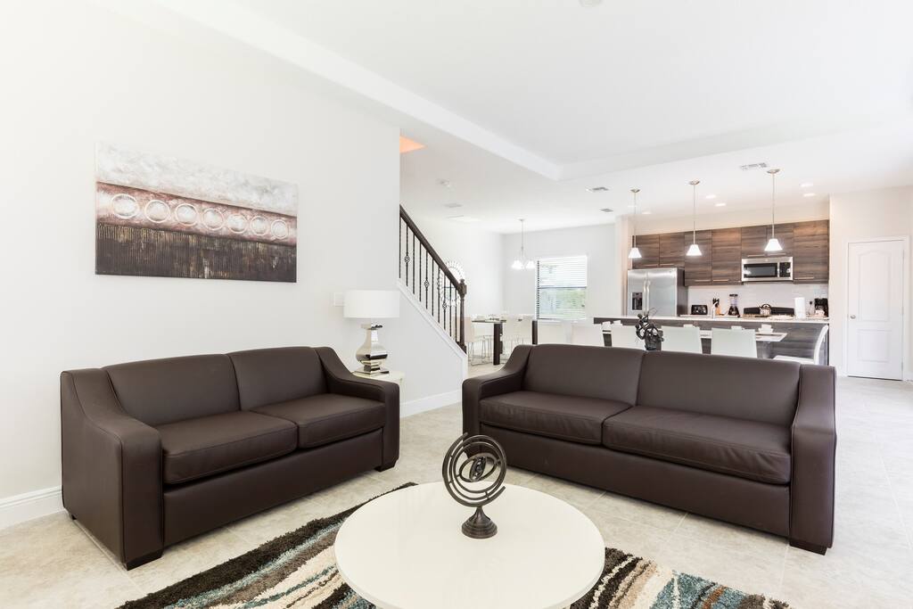 Relax in the cozy and spacious living room or on the patio!