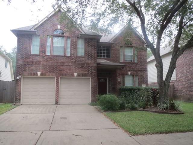 Queen sized bedroom in Sugarland.