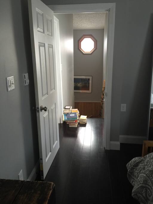 Third floor is shared with a private bedroom and shared bath on the third floor of this home.