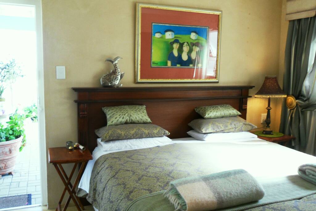 Lower level mini unit with en suite shower and kitchenette & private patio