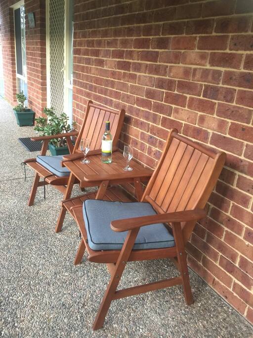 Enjoying a refreshment on the Verandah