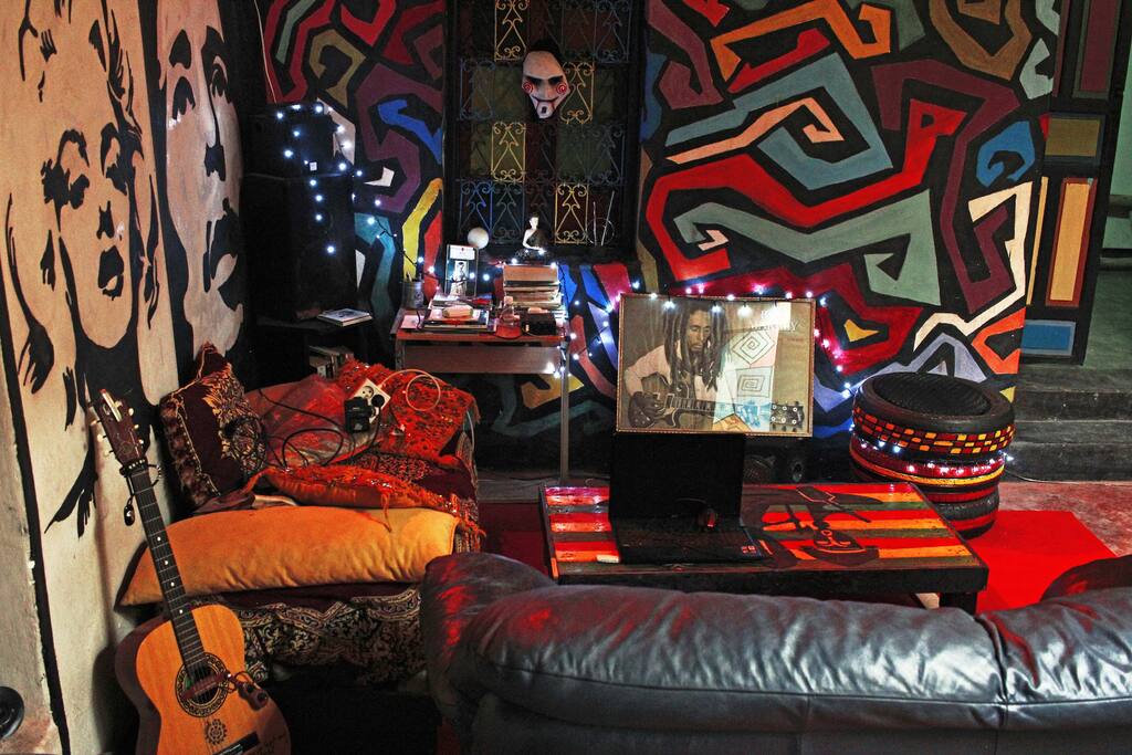 One bed and a couch in shared common space