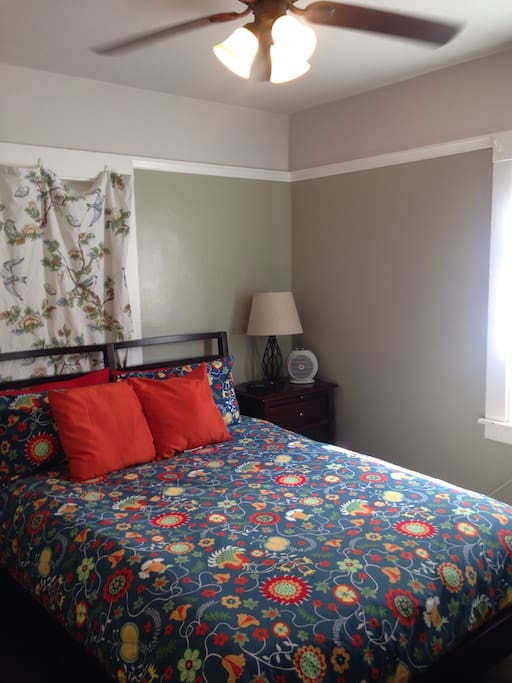 Overhead light and fan with remote control. Tall ceilings. Blinds for natural light. Smoke detector.