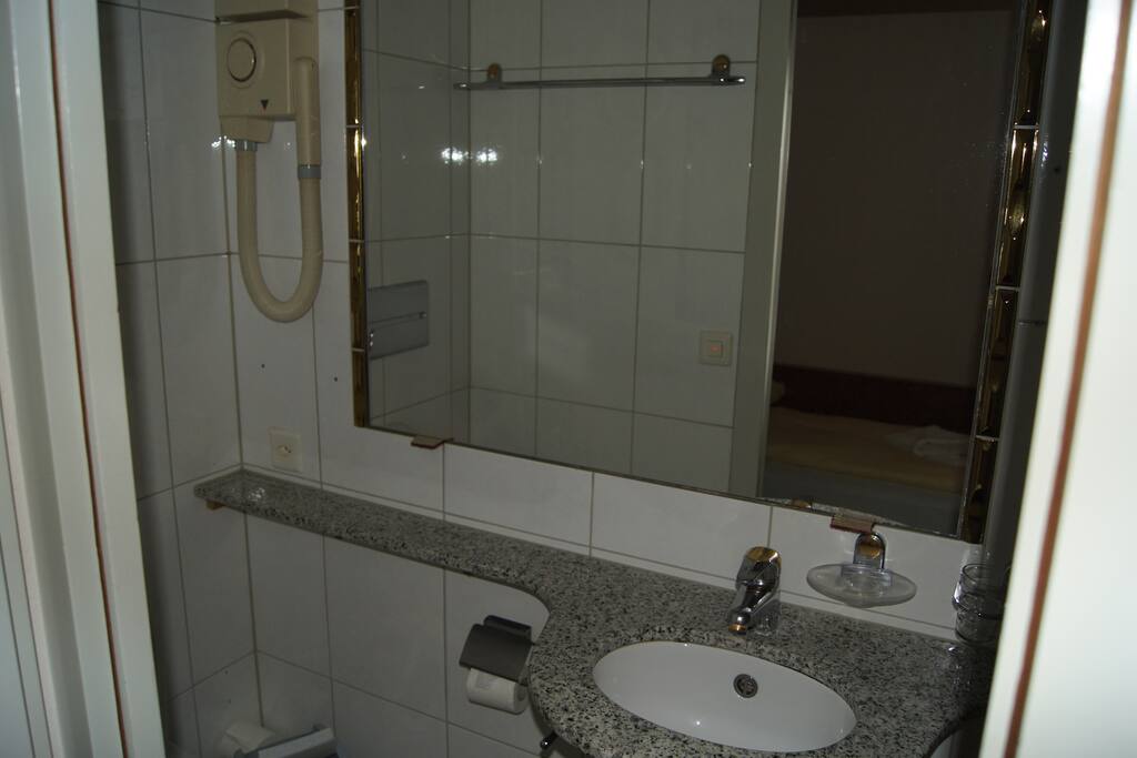 En Suite bathroom with hairdryer
