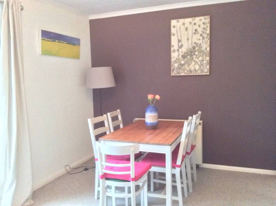 Dining area, seats 5. Plus spare folding chairs in cupboard.