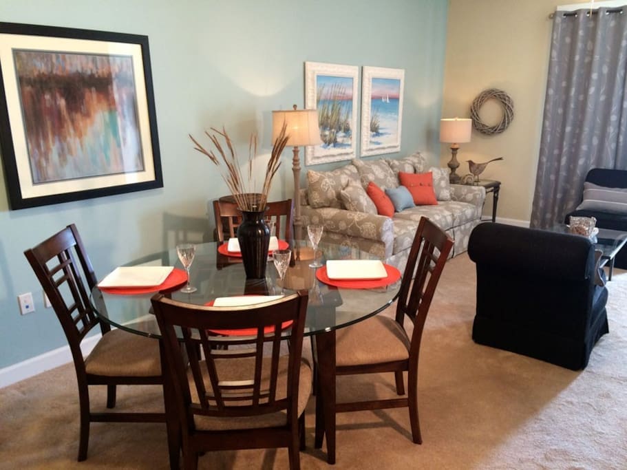Dining space inside as well as a four-seat patio table outside.