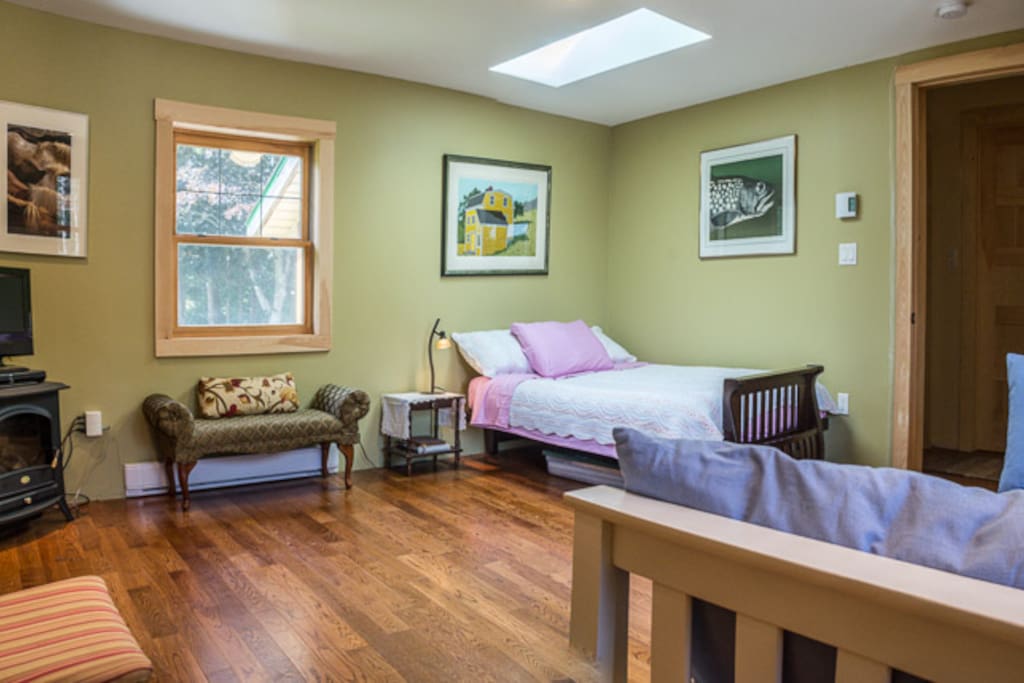 Double bed futon with memory foam topper. Skylight to watch the stars right from your bed.