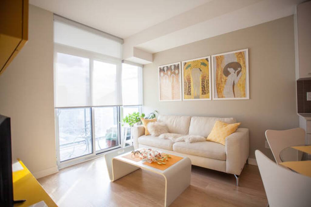 Living space with a comfortable sofa and a TV station