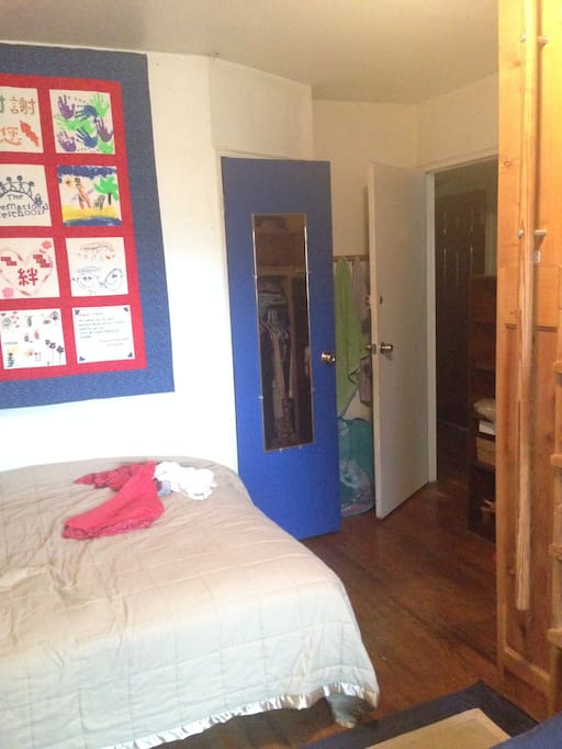 Blue door access to the private bathroom