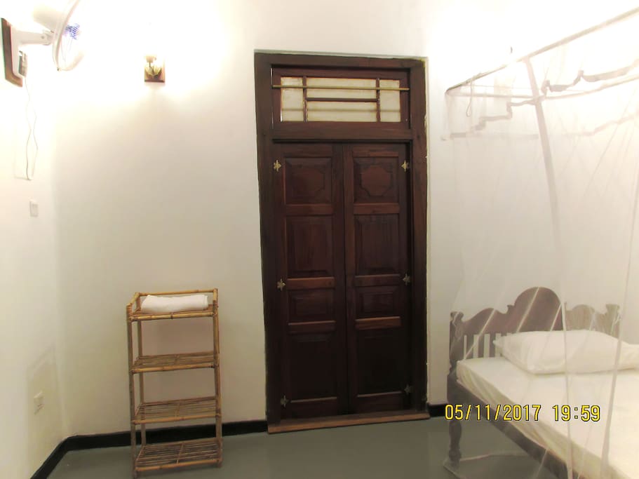 The bedroom with Double size bed interconnects to a second bedroom with a Queen size bed