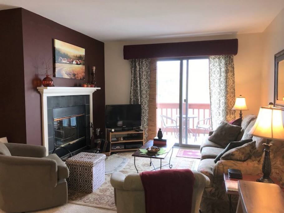 Living Room with Mountain Views, Fire Place, Pull Out Sofa and Balcony