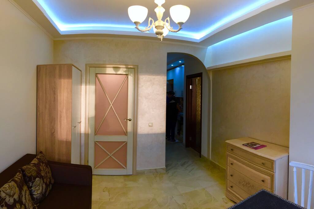 view from Dinning room with door to Bedroom one.