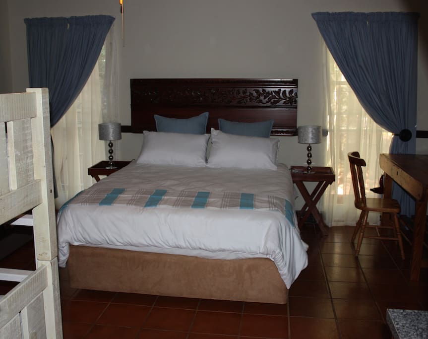 Room 1, sleeps 4, queen & bunk beds, ensuite