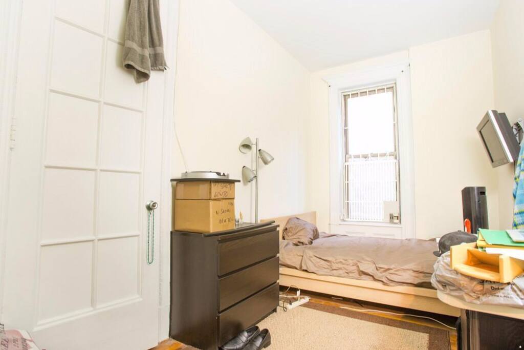 Bedroom with walk-in closet