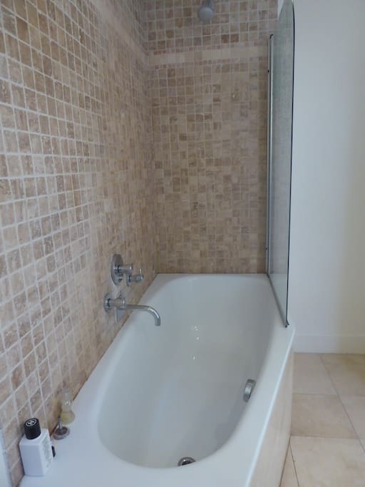 En suite bath and shower