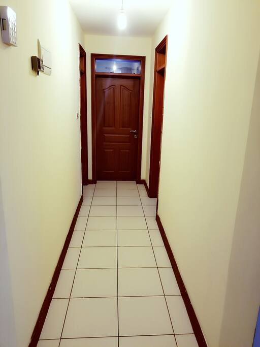 Hallway to guest room and toilet