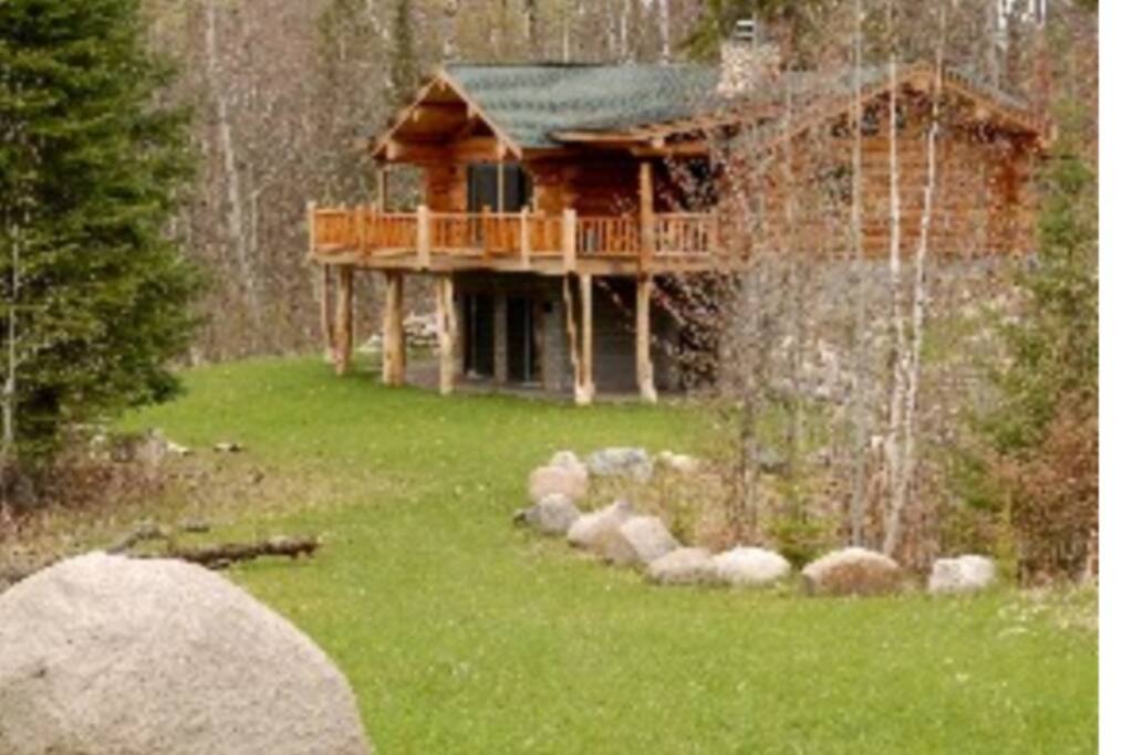 Nice big yard overlooking the lake. Firepit and room for yard games