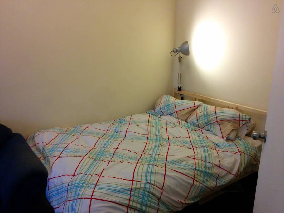 Double bed with reading light.