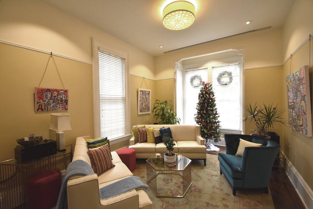 All the living room furniture has been replaced with updated new pieces that work better with the flow of the room. The tree and window wreaths are temporary for the December holidays.