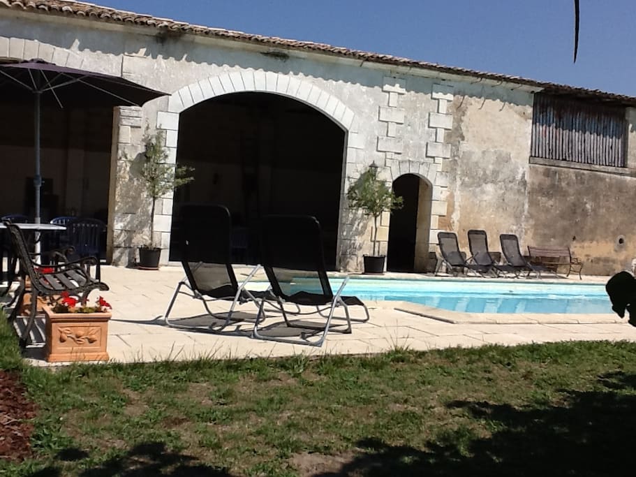 Pool area with sun chairs