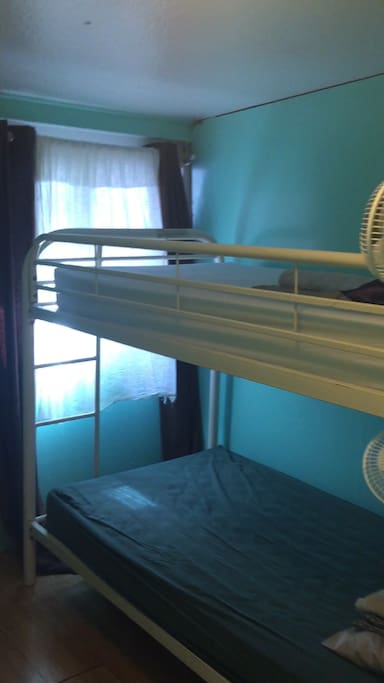 Twin bunk bed with personal fan