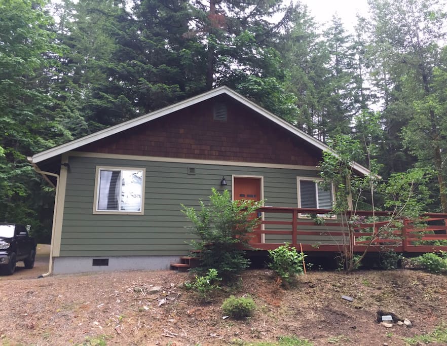 Back view of house/deck from the yard