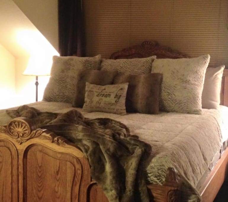 Cozy master bedroom with super comfortable king bed and private bath creating a nice little master retreat