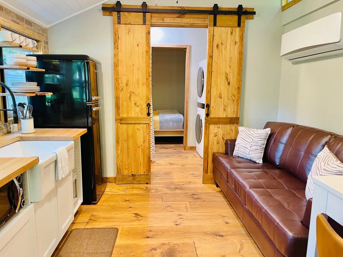 Sofa sleeper pulls out to a queen bed.