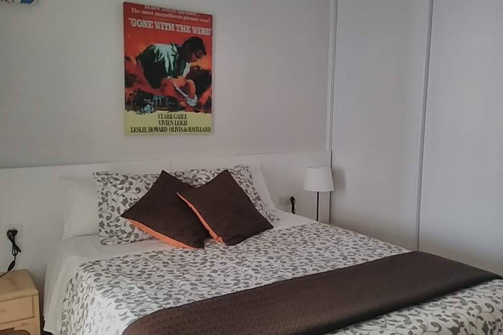 Double bed in separate bedroom