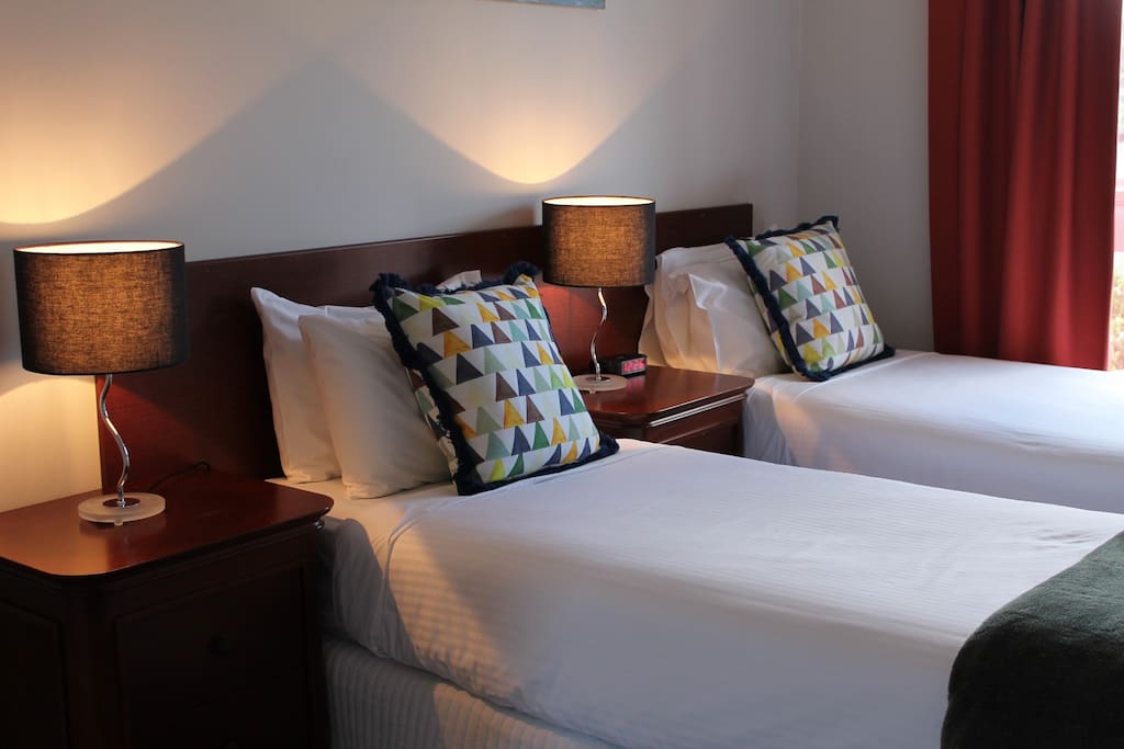 You can choose either 2 single beds or a queen bed in the 2nd bedroom