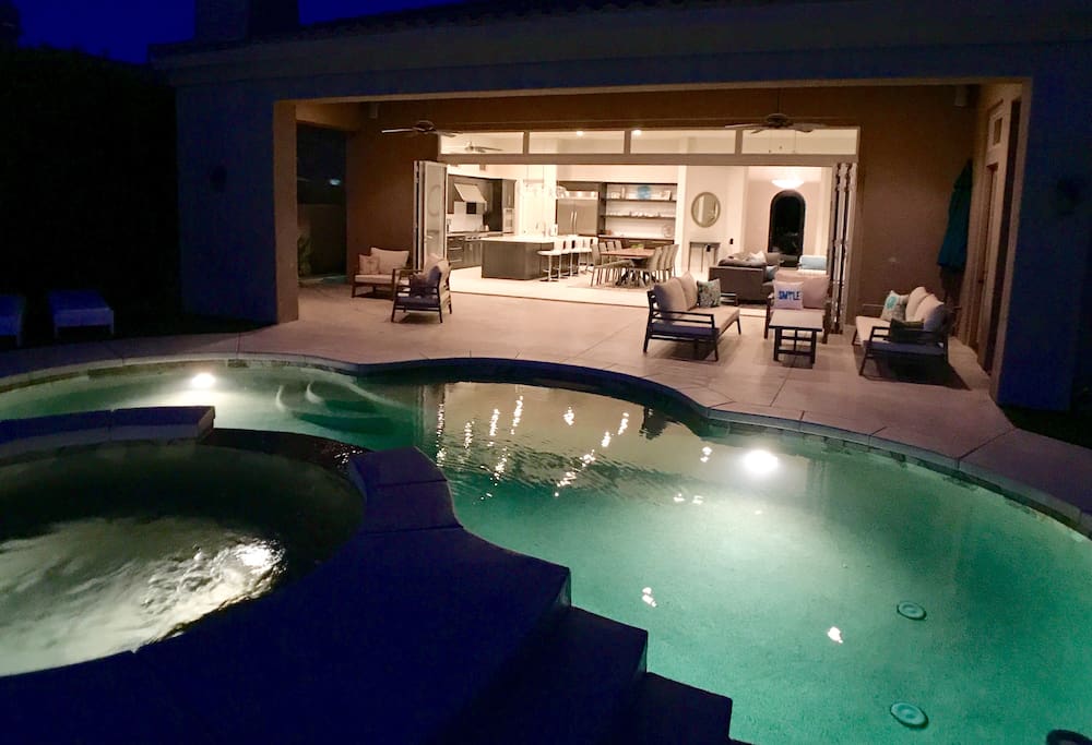 Enjoy the pool and hot tub day or night